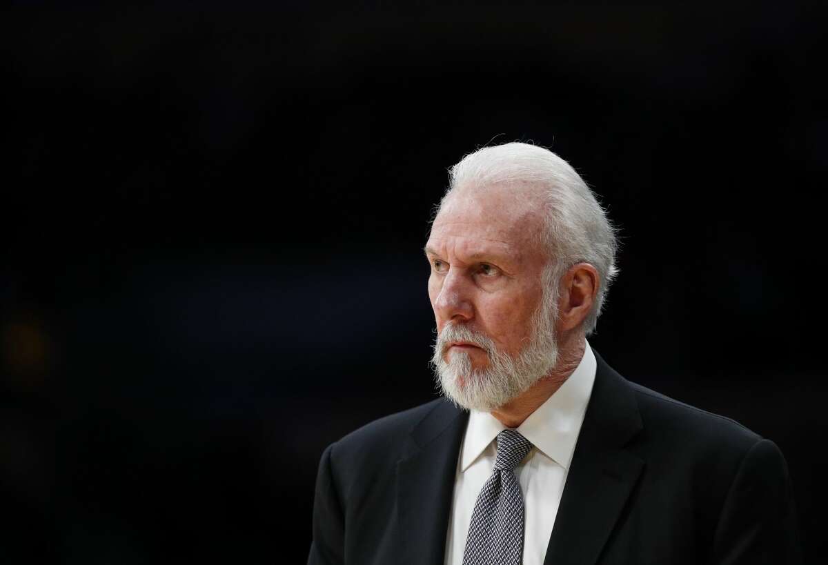 San Antonio Spurs head coach Gregg Popovich watches the first half of an NBA basketball game against the Los Angeles Lakers, Sunday, Feb. 26, 2017, in Los Angeles. (AP Photo/Jae C. Hong)