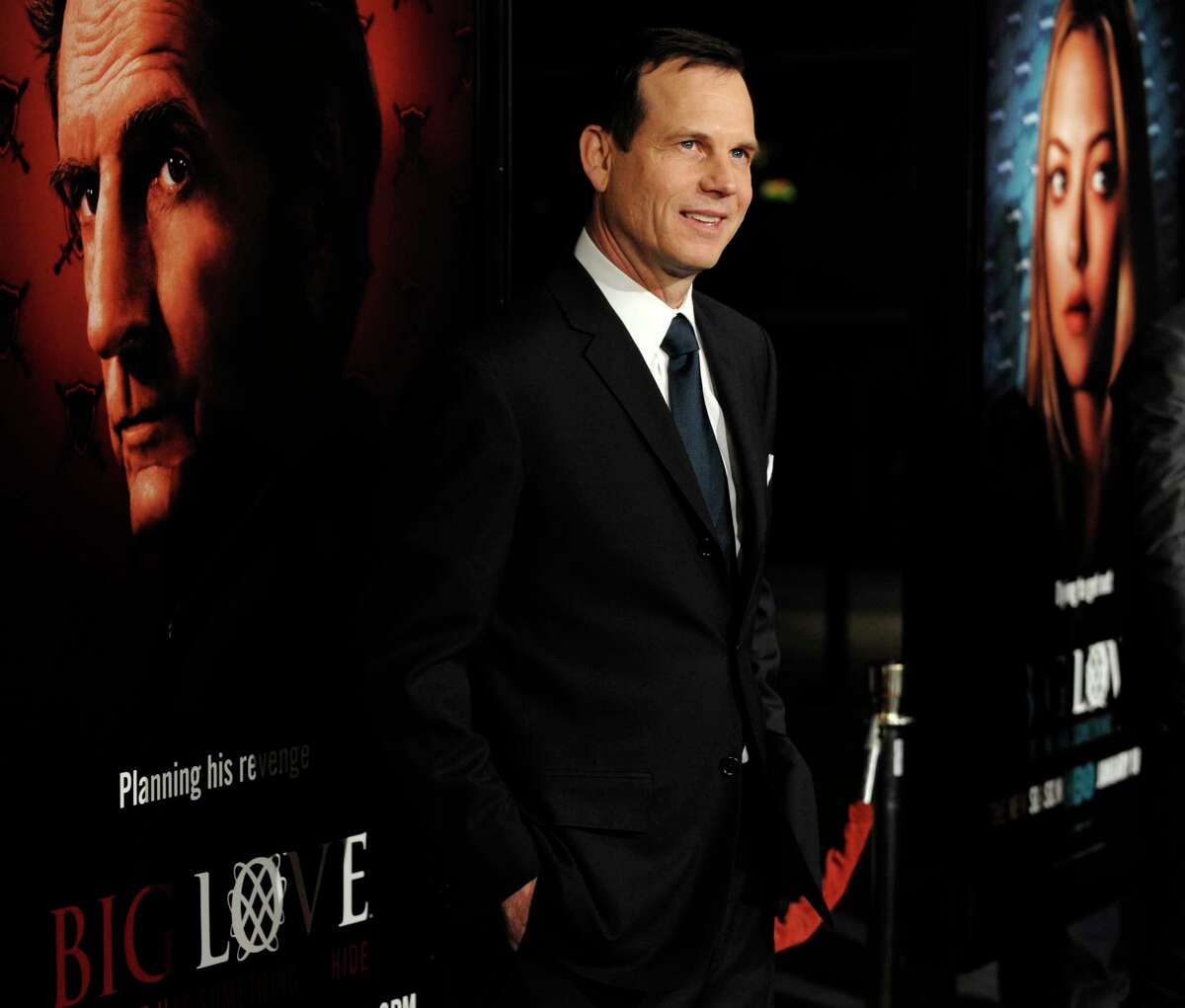 FILE - In this Wednesday, Jan. 14, 2009, file photo, Bill Paxton, a cast member in the HBO series "Big Love," poses at the show's third season premiere in Los Angeles. A family representative said prolific and charismatic actor Paxton, who played an astronaut in "Apollo 13" and a treasure hunter in "Titanic," died from complications due to surgery. The family representative issued a statement Sunday, Feb. 26, 2017, on the death. (AP Photo/Chris Pizzello, File)