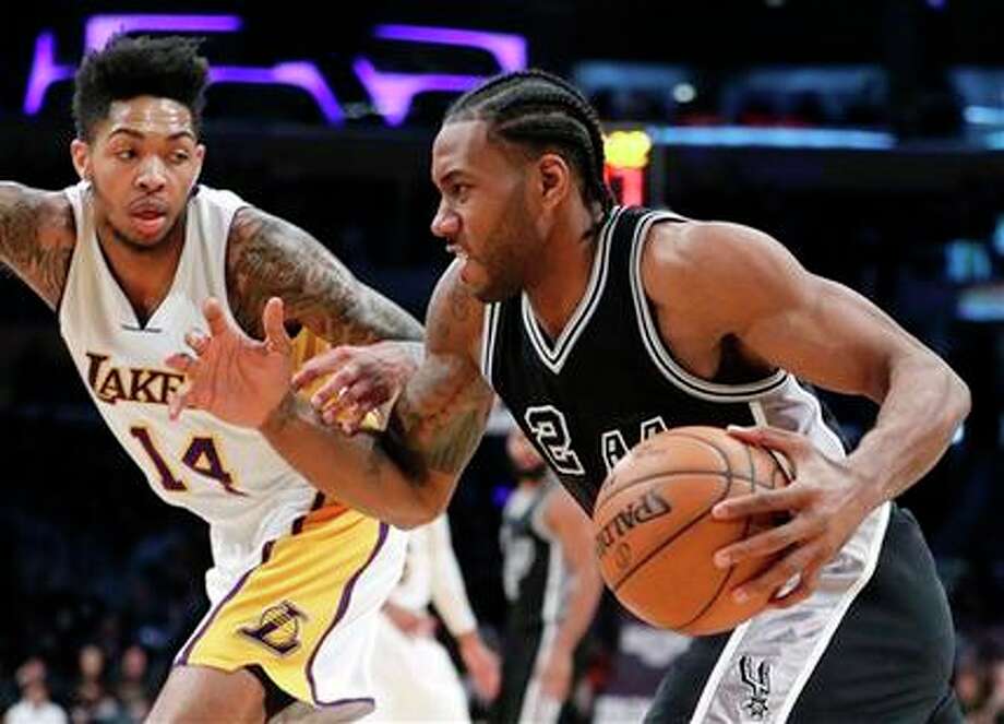 who was kawhi leonard traded for on draft night