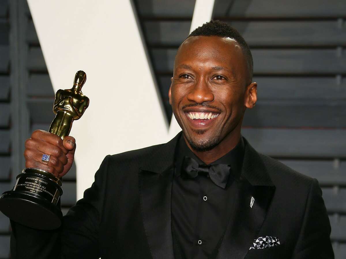 US actor Mahershala Ali, winner of the Best Supporting Actor award for 'Moonlight', poses with his Oscar as he arrives to the Vanity Fair Party following the 88th Academy Awards at The Wallis Annenberg Center for the Performing Arts in Beverly Hills, California, on February 26, 2017. 