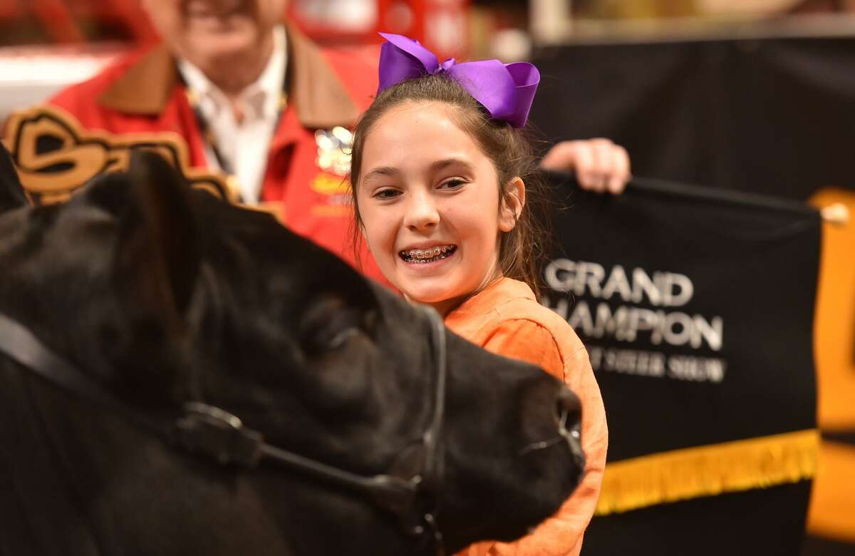 Aven Horn of Abilene, Tx., smiles as her steer was named Grand Champion Steer Friday evening at the San Antonio Stock Show and Rodeo.