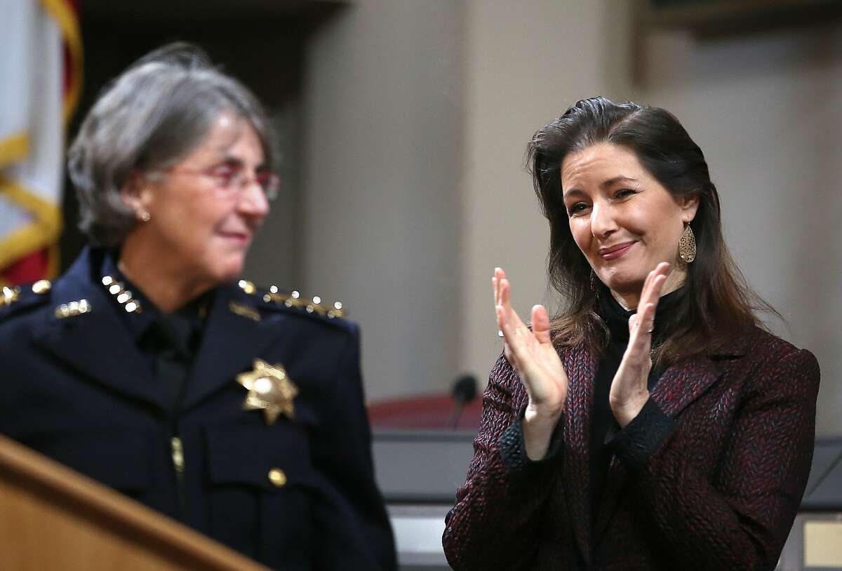 Mayor Libby Schaaf (right) claps after Anne Kirkpatrick's speech at an Oakland City Hall ceremony on February 27, 2017.