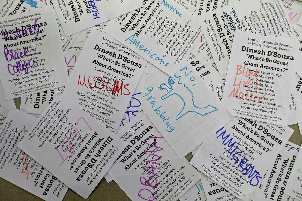 Fliers for a speech by Dinesh D'Souza at Trinity University were vandalized and returned to the brothers distributing them.