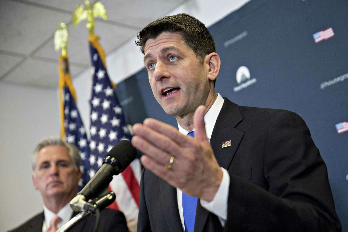 U.S. House Speaker Paul Ryan, a Republican from Wisconsin, speaks as House Majority Leader Kevin McCarthy, a Republican from California, left, listens during a news conference after a House Republican Conference meeting on Capitol Hill in Washington, D.C., U.S., on Tuesday, Feb. 28, 2017. Congressional Republicans will look for any endorsement by U.S. President Donald Trump during his address to Congress tonight of a border-adjusted tax, a roughly $1 trillion revenue-raiser that sits at the heart of House Speaker Paul Ryans plan to slash corporate and individual tax rates. Photographer: Andrew Harrer/Bloomberg