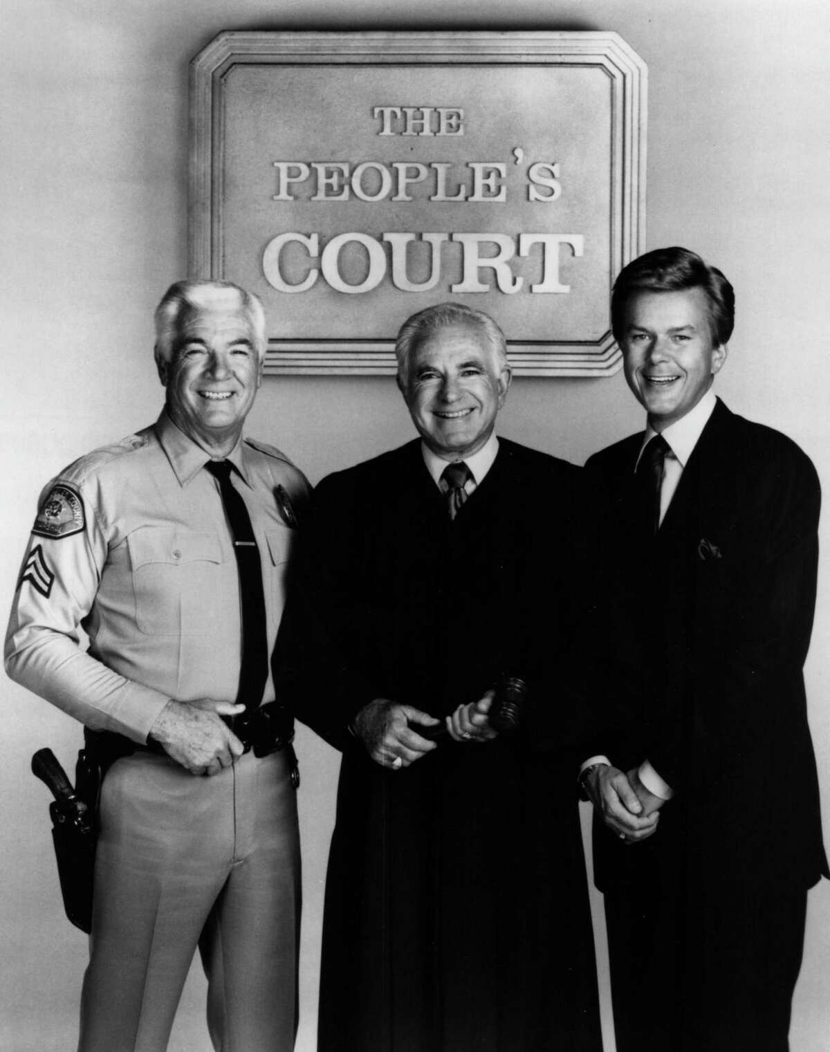 "The People's Court" cast, Rusty the bailiff, Judge Joseph Wapner and Doug Llewelyn.