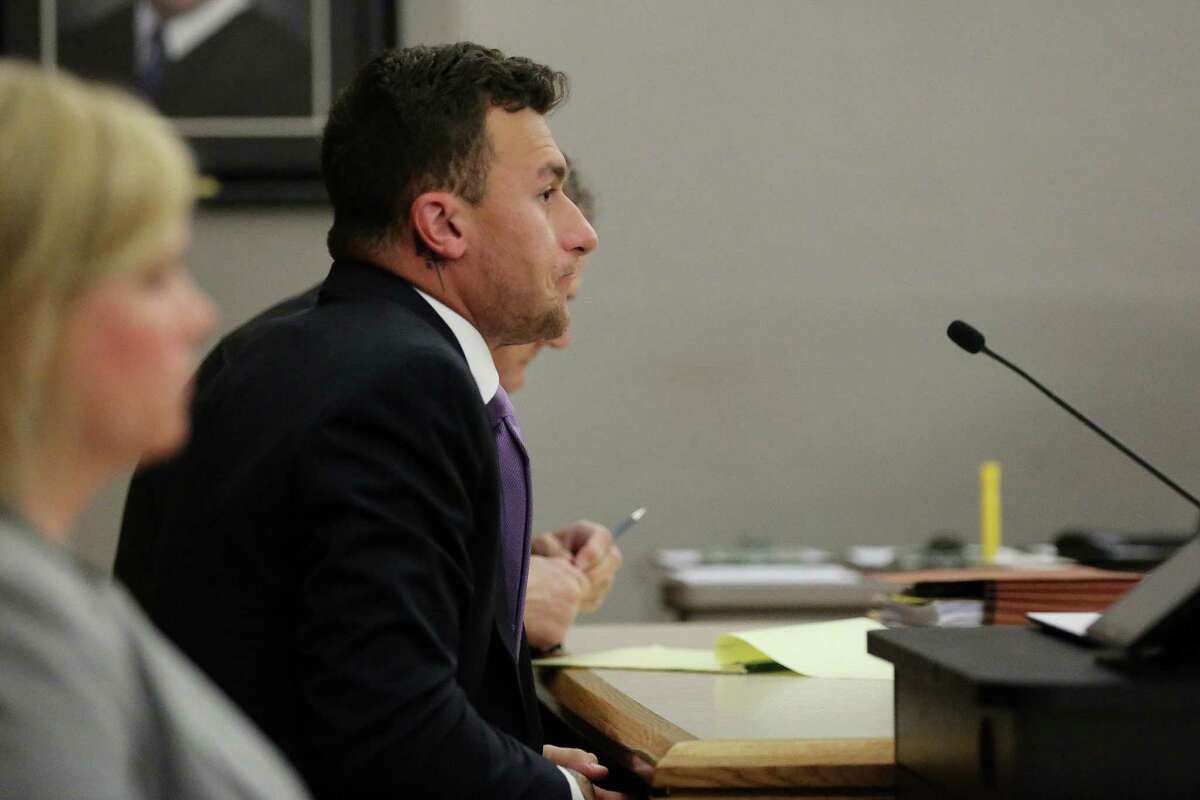 Former Texas A&M quarterback Johnny Manziel listens during a hearing with judge Roberto Canas in Dallas County criminal court 10 at the Frank Crowley Courts Building in Dallas February 28, 2017. Manziel is in a hearing following an agreement reached with the county regarding his misdemeanor domestic violence case. (Andy Jacobsohn/The Dallas Morning News via Pool)
