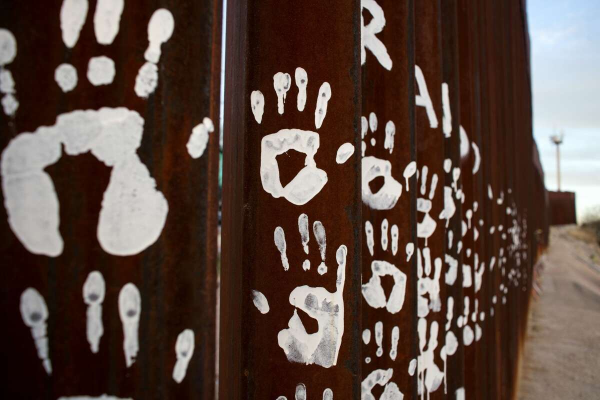 Mexico Hand prints are seen on a wall on the US/Mexico border line in Nogales, on February 16, 2017, northwestern Mexico.
