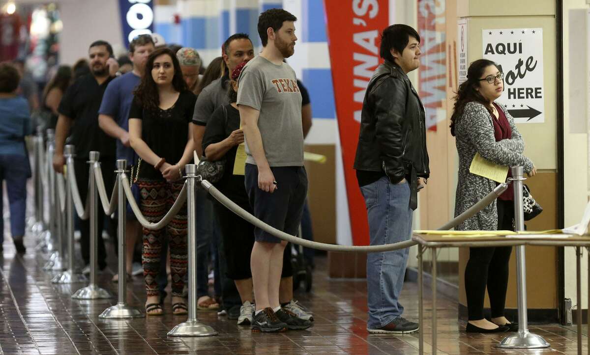 People line up to vote at the Wonderland of the Americas Mall Friday November 4, 2016 on the last day of early voting for the 2016 election.