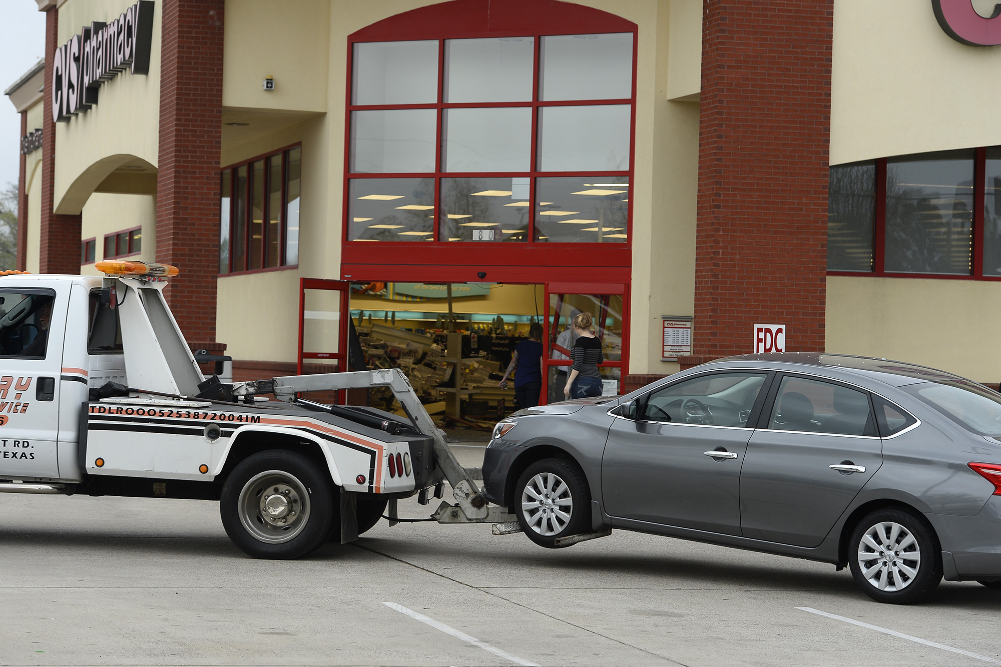 Photos Car drives through Beaumont CVS