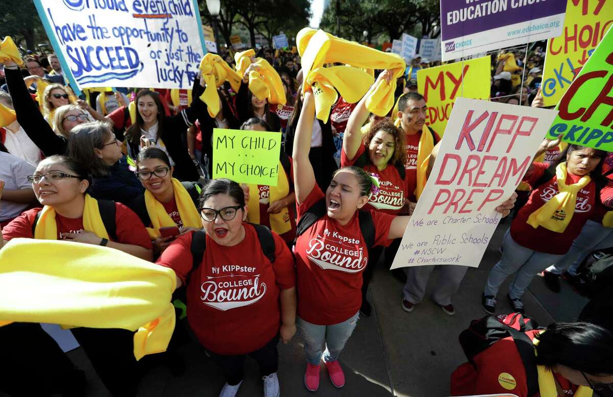Parents, students and administrators take part in a rally in support of school choice, Tuesday, Jan. 24, 2017, in Austin , Texas. Past voucher programs seeking to provide public money to families who send their children to private and religious schools have sailed through the state Senate but fizzled in the House, where lawmakers from both parties worry about hurting rural classrooms _ but rally organizers are hoping that added political pressure could change that this session. (AP Photo/Eric Gay)