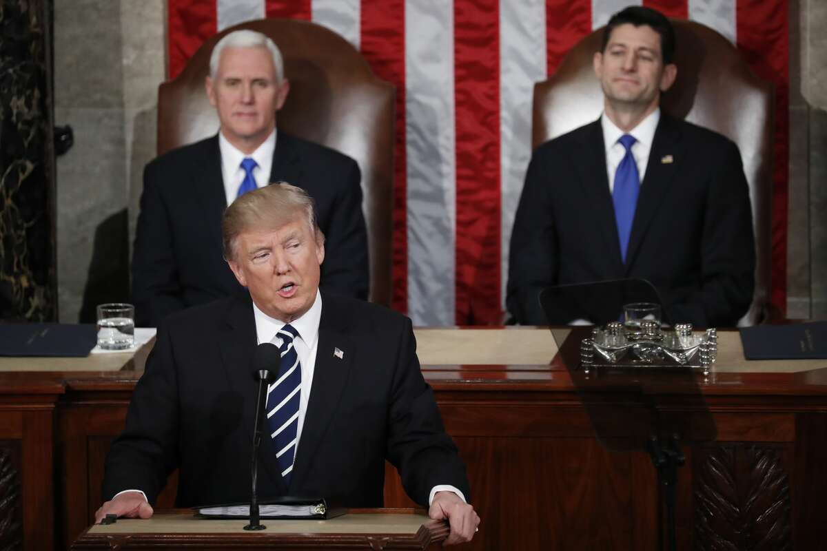 Vice President Mike Pence and House Speaker Paul Ryan of Wis. listen as President Donald Trump addresses a joint session of Congress on Capitol Hill in Washington, Tuesday, Feb. 28, 2017. (AP Photo/Pablo Martinez Monsivais)