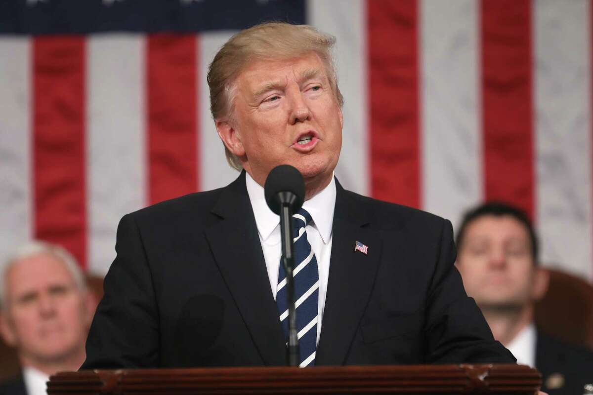 WASHINGTON, DC - FEBRUARY 28: (AFP OUT) U.S. President Donald Trump addresses a joint session of the U.S. Congress on February 28, 2017 in the House chamber of the U.S. Capitol in Washington, DC. Trump's first address to Congress is expected to focus on national security, tax and regulatory reform, the economy, and healthcare. (Photo by Jim Lo Scalzo - Pool/Getty Images) ORG XMIT: 700003147