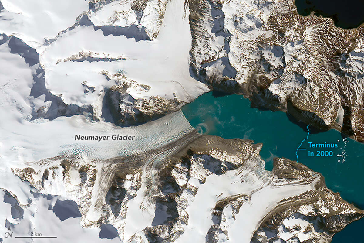 This is a closer crop of the Landsat scene, showing Neumayer Glacier. A blue line indicates its terminus, or leading edge, on Sept. 10, 2000. In the past 16 years, Neumayer has retreated more than four kilometers (2½ miles).