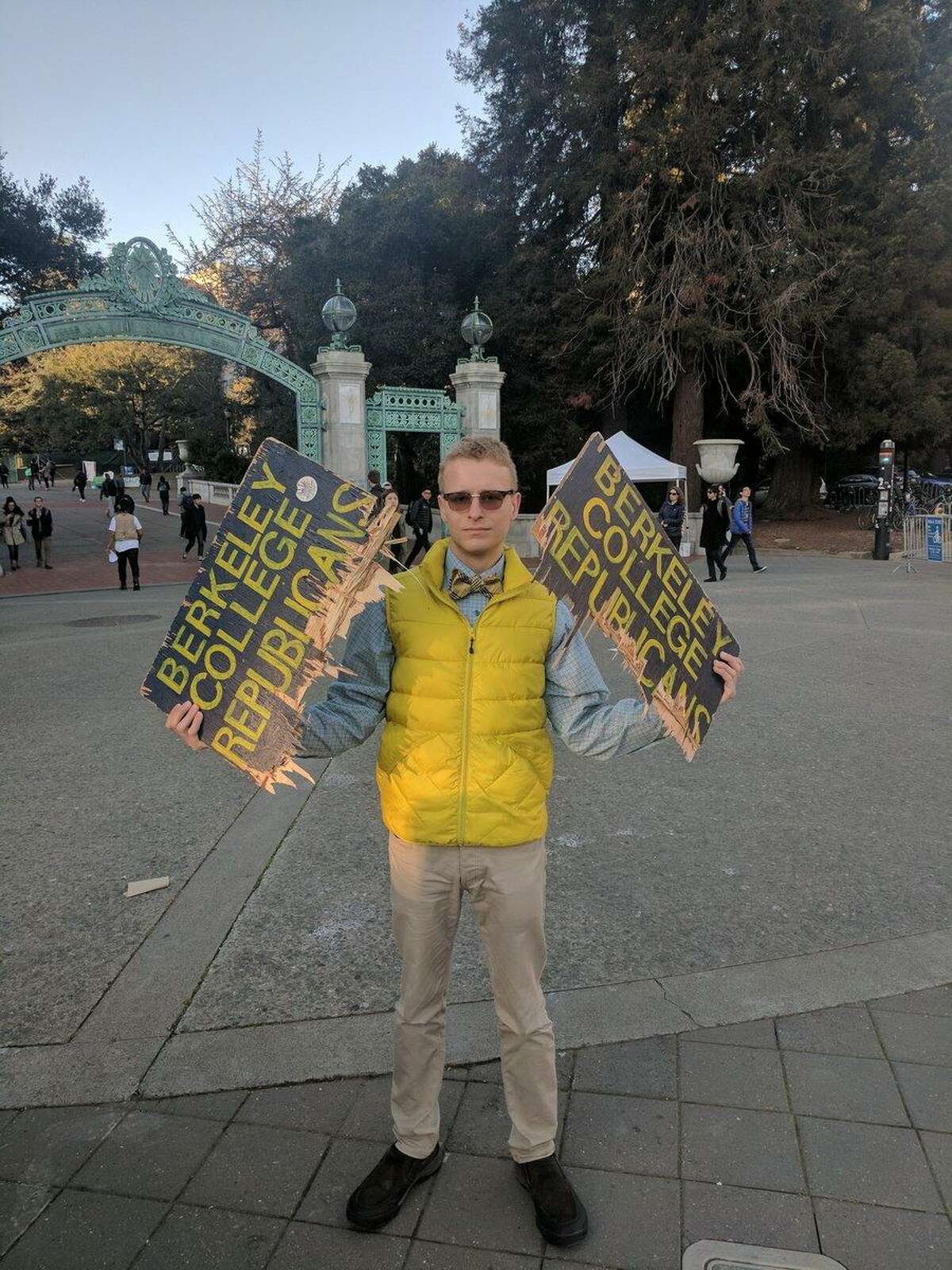 Troy Worden, a member of the Berkeley College Republicans and third year student, displays one of the group’s signs that was destroyed on campus Tuesday evening.