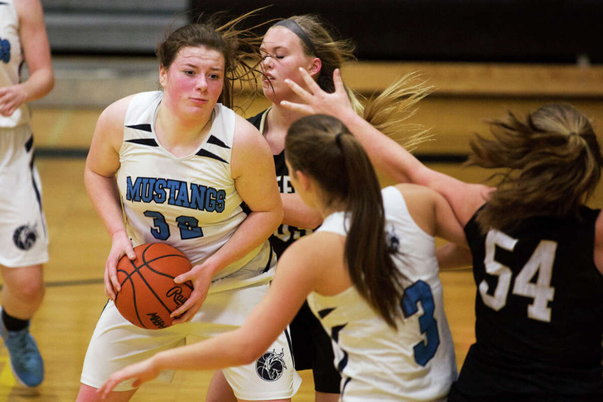 THEOPHIL SYSLO | For the Daily News Meridian's Audrey Kielpinski controls the ball while being defended by Bullock Creek's Mayson Barringer in Wednesday's game.