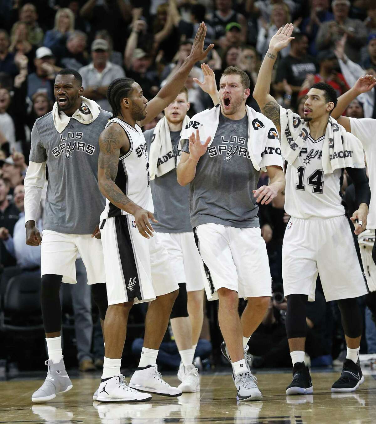 Spurs?’ Kawhi Leonard (02) gets congratulated by the team bench after hitting the winning shot against the Indiana Pacers at the AT&T Center on Wednesday, Mar. 1, 2017. Spurs defeated the Pacers, 100-99. (Kin Man Hui/San Antonio Express-News)