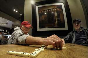 Stamford group maintains nightly dominoes tradition