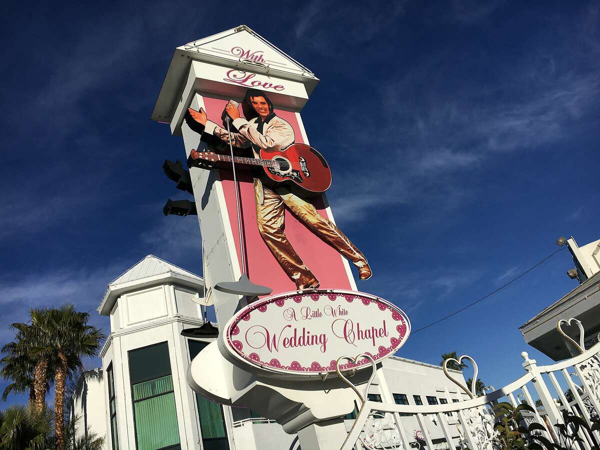 The swiveling image of Elvis adorns a sign in front of one of the many chapels along Las Vegas Boulevard that themed weddings.