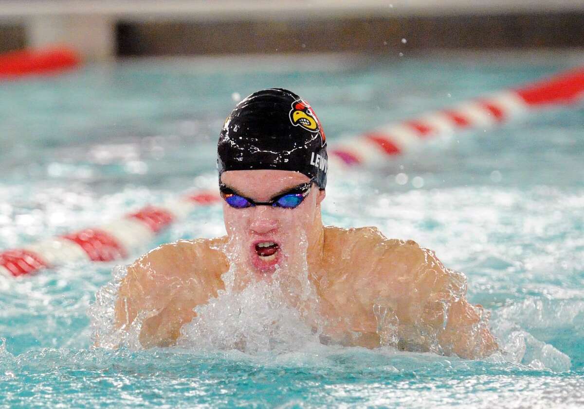 Aedan Lewis of Greenwich swims the breaststroke leg of the 200 medley relay event during the FCIAC Boys High School Swimming Championships at Greenwich High School on Thursday night. Greenwich placed first as a team.