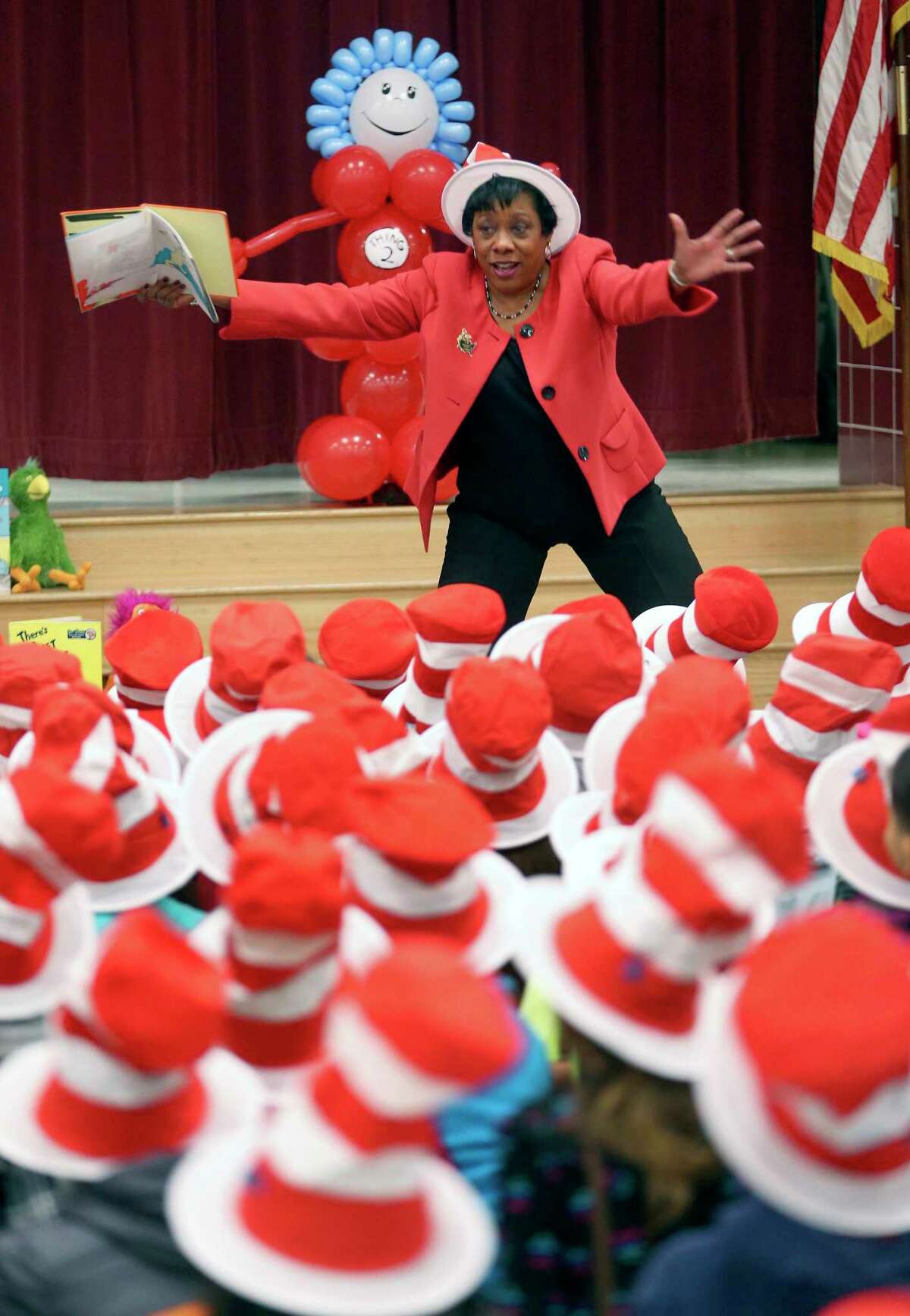 Becky Pringle, vice president of the National Education Association, reads Dr. Seuss's Green Eggs and Ham Thursday, March 2, 2017 at Hidden Cove Elementary during a Read Across America celebration for K-3rd graders at the school. Read Across America, a National Education Association-organized event is held on Dr. Seuss's birthday, March 2nd, every year.