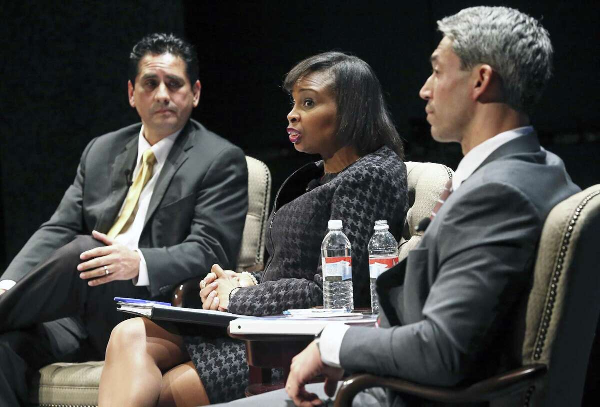 Manuel Medina (left to right) Ivy Taylor and Ron Nirenberg contend as mayoral candidates debate on stage at the Tobin Center during the Hispanic Chamber Mayoral Debate moderated by Steve Spriester on March 2, 2017.
