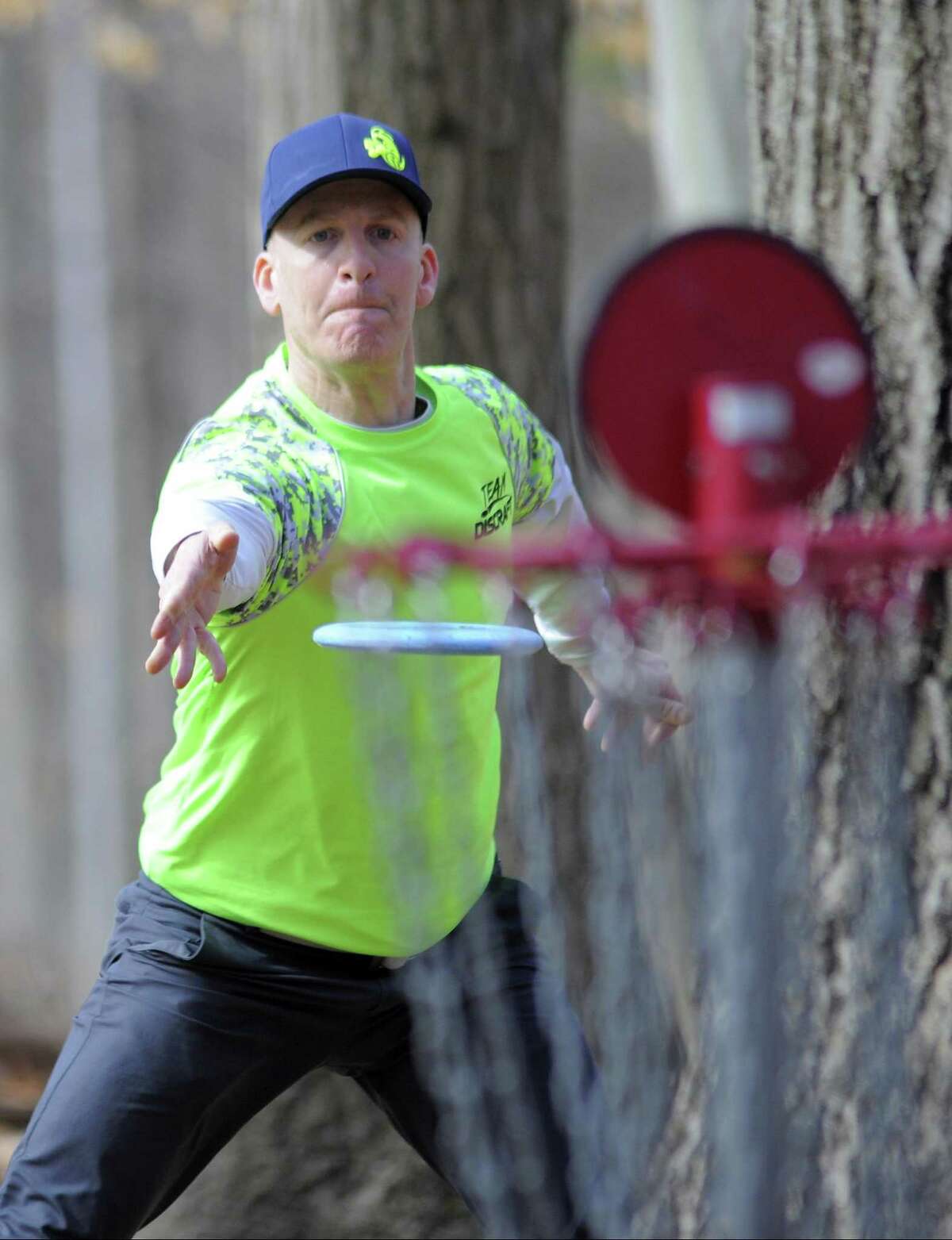 Professional Disc Golfer Adam Goodman of Fairfield forehands the disc at the second hole as he competes in the 2017 Cranbury Ice Bowl, a disc golf charity event at Norwalk's Cranbury Park on Feb. 25. A mix of professional and amateur disc golf players participated in the two round 18-hole tournament, raising over $2500.00 in cash/can food donations that will benefit the Norwalk food shelter. It's the disc golfers way of saying thanks to the city of Norwalk for all the support over years.