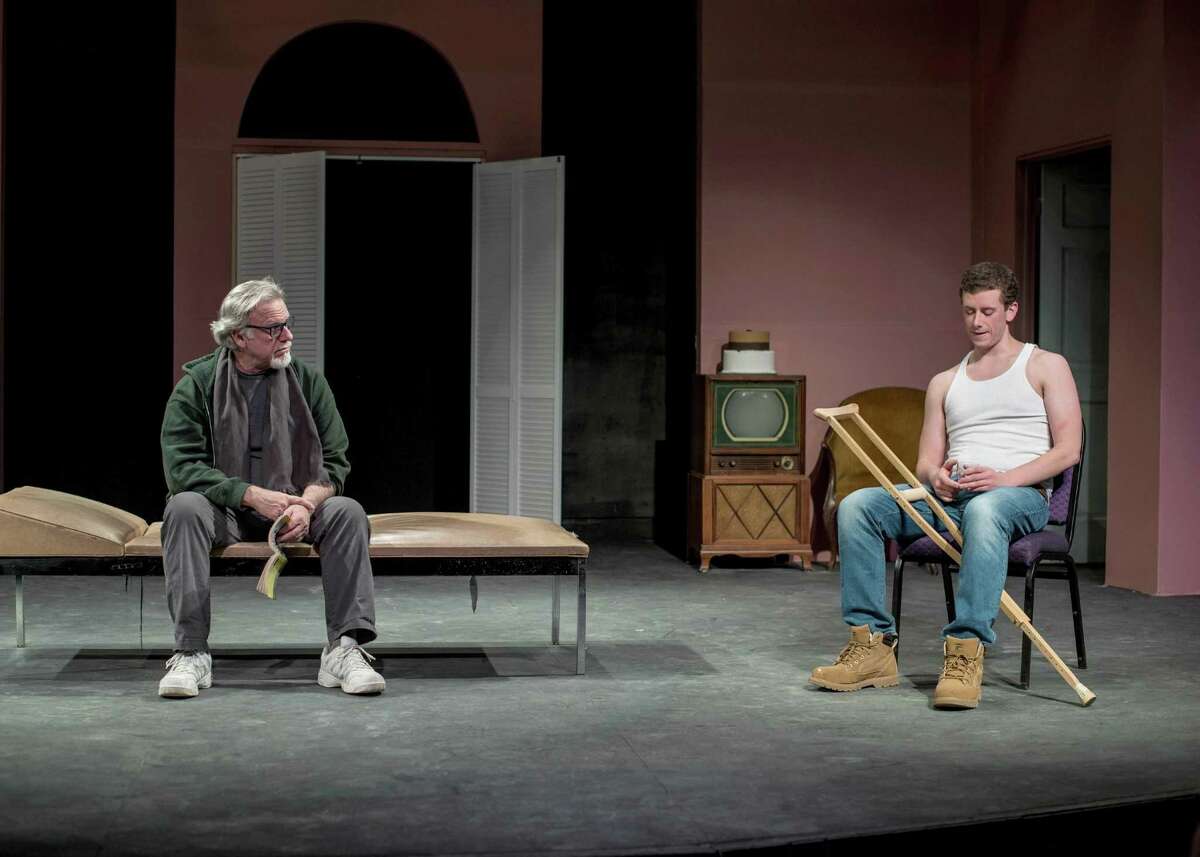 Big Daddy (Will Jeffries) confronts Brick (James Wilding) about his drinking in “Cat on a Hot Tin Roof,” on stage at Brookfield Theatre For the Arts through Saturday, March 18.