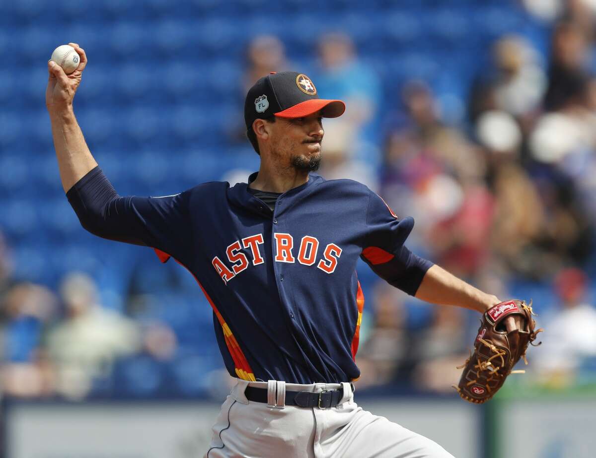 Houston Astros starting pitcher Charlie Morton (50) works in the first inning of a spring training baseball game against the New York Mets, Friday, March 3, 2017, in Port St. Lucie, Fla. (AP Photo/John Bazemore)
