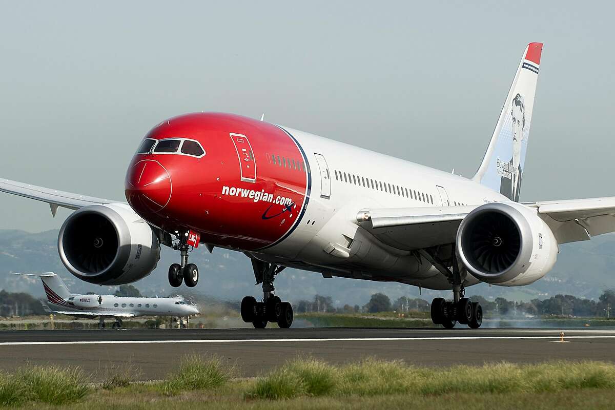 A Norwegian Air plane arriving from Stockholm touches down at Oakland International Airport on Friday, March 3, 2017, in Oakland, Calif.