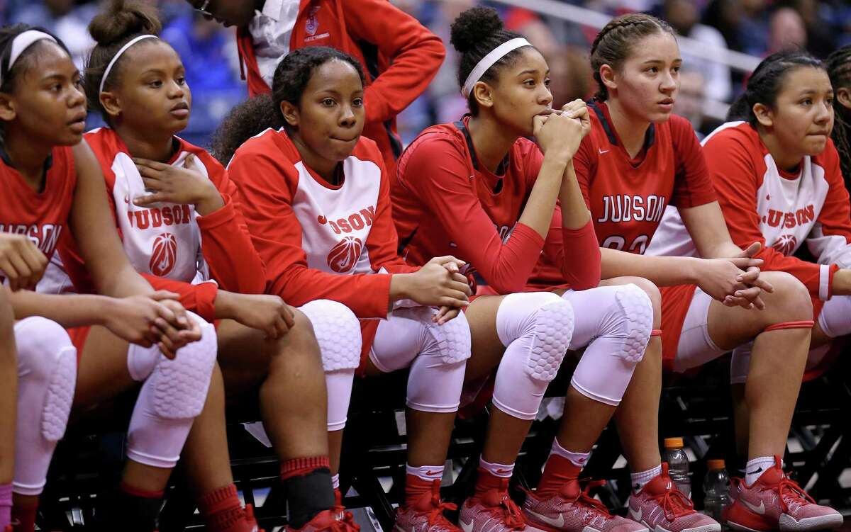 Members of the Judson Rockets watch second half action of their Class 6A state semifinal game against the Duncanville from the bench Friday March 3, 2017 at the Alamodome.