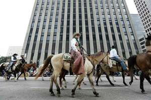 Spectators line streets for annual downtown rodeo parade