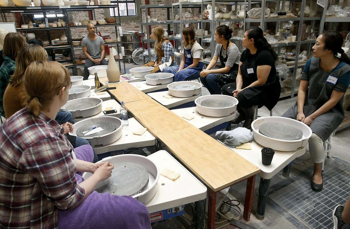 Students are focused on American-born master potter Eric Landon, co-founder of the Tortus Copenhagen ceramics studio in Denmark, during a two-day pottery workshop at Clay by the Bay in San Francisco, Calif. on Saturday, March 4, 2017.