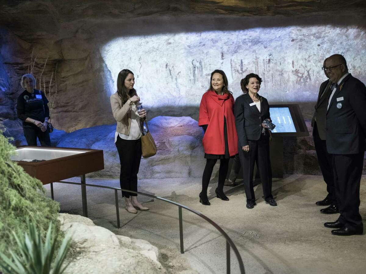 Texas First Lady Cecilia Abbott, center in red, receives a tour from President and CEO of Witte Museum Marise McDermott, second left, at the opening of the renovated Witte Museum on Broadway street near Brackenridge Park in San Antonio, Texas on Saturday, March 4, 2017. The WItte has now completed a major renovation of more than 174,000 square feet of space with new galleries and exhibit space.