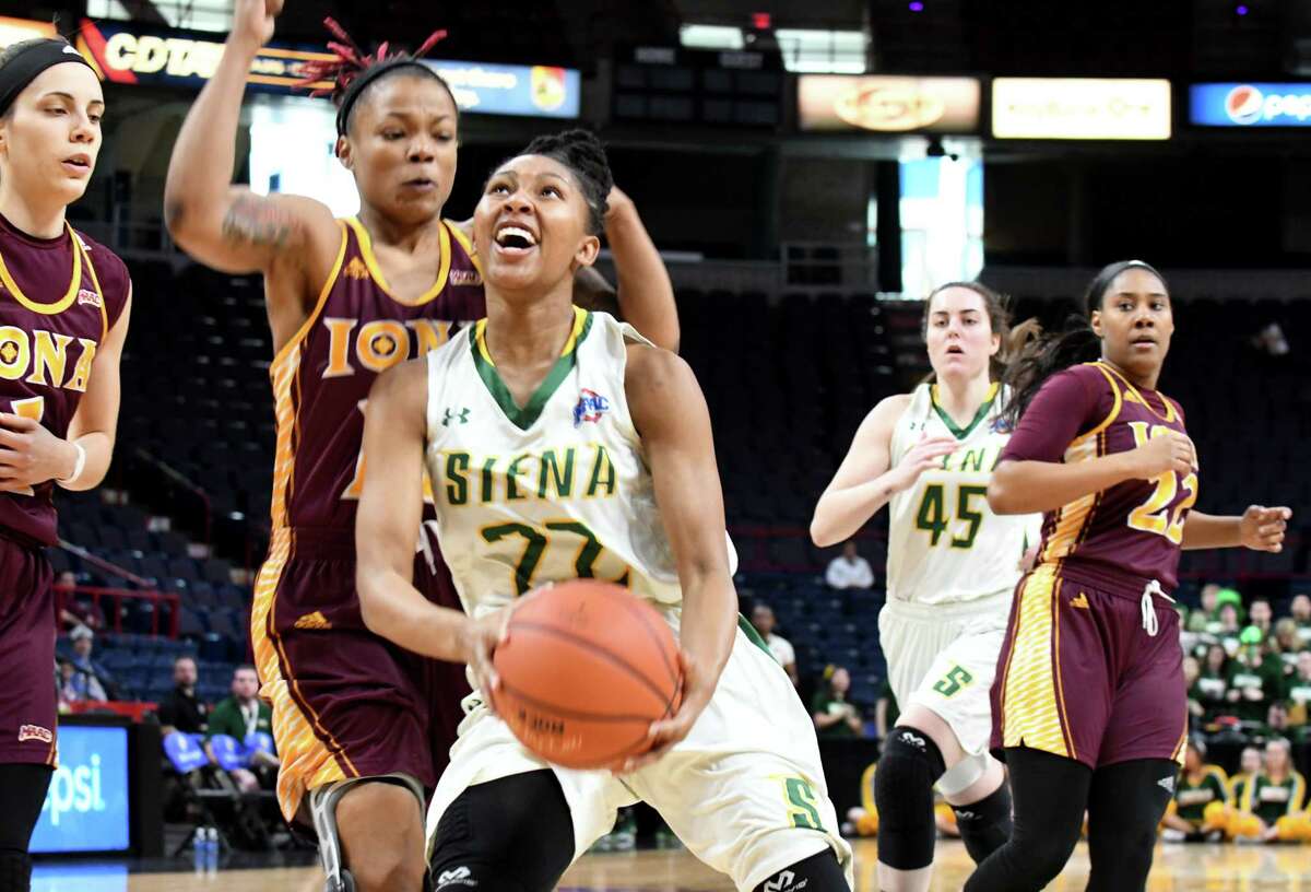 Deja Rawls of Siena drives to the net during the first half against Iona at the MAAC Tournament on Saturday afternoon, March 4, 2017, at the Times Union Center in Albany, N.Y. (Will Waldron/Times Union)