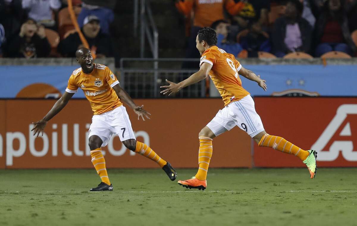 Houston Dynamo forward Erick Torres (9) reacts with DaMarcus Beasley (7) after Torres' free kick went in for the first goal of the night for the Dynamo during the first half of the season opening MLS soccer game at BBVA Compass stadium, Saturday, March 4, 2017, in Houston. ( Karen Warren / Houston Chronicle )