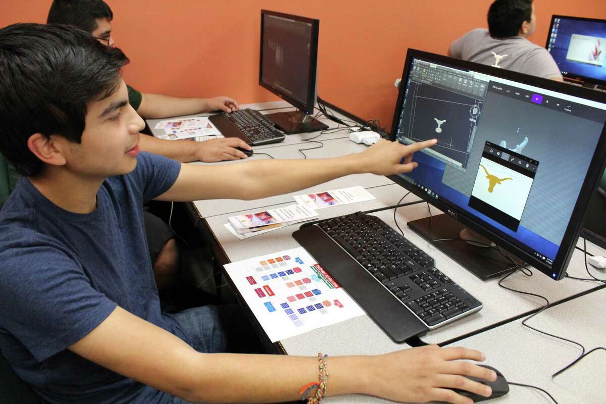 Laredo Community College student Phillip Bondoc explains the process used to create his very own 3D electronic solid model during Computer Aided Drafting Day in February. Click ahead to see photos from LCC's Family Fun Fest.