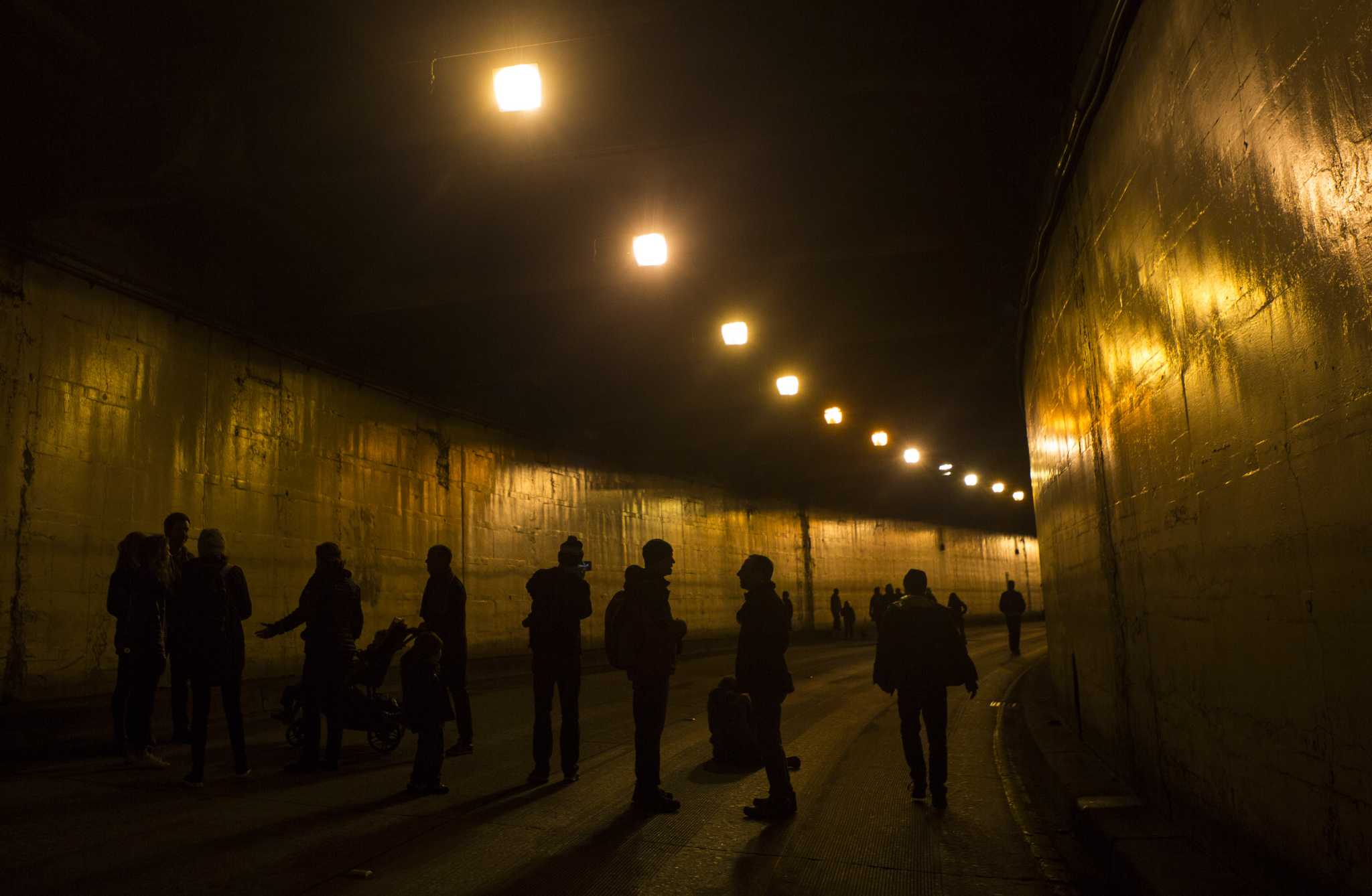 Hundreds walk through the Battery Street Tunnel
