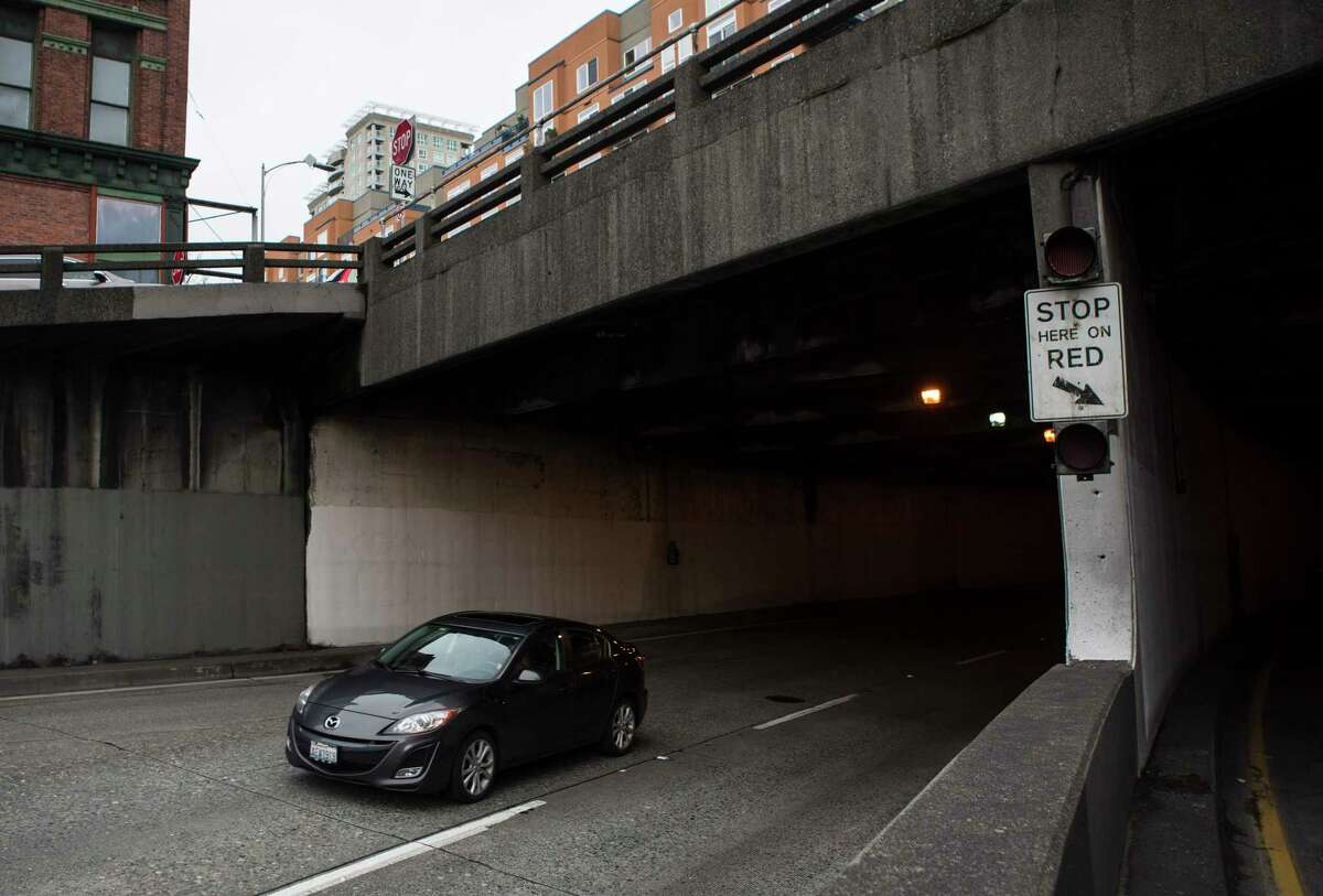 A car drives southbound out of the Battery Street Tunnel towards the Alaskan Way Viaduct on Sunday, Mar. 5, 2017.