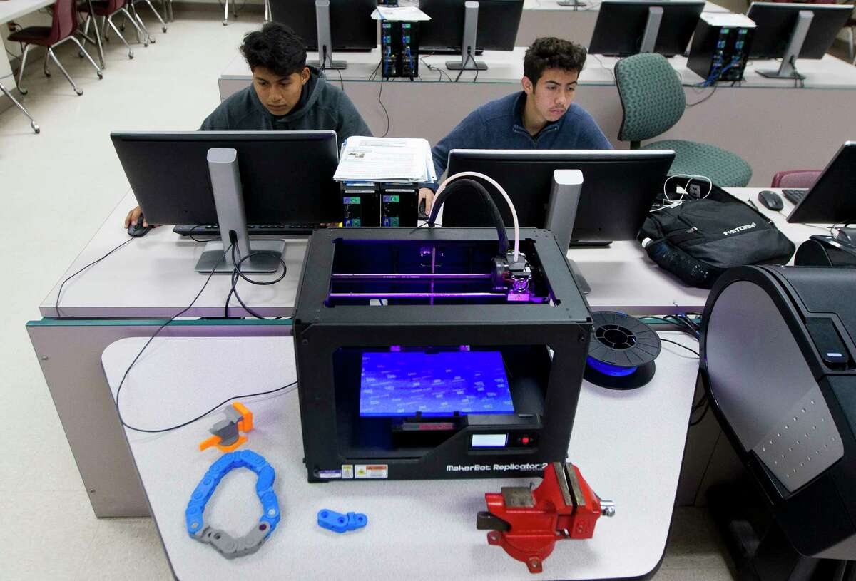 Willis High School seniors Marco Gonzalez, 17, and Gabriel Ramirez, 18, work on engineering projects Wednesday in Willis. Gonzalez and Ramirez are preparing to take their engineering certification test as part of the district's engineering class. Willis ISD plans to open a $39.4 million Career and Technology Education building as part of the $109.5 million bond passed in November 2015.