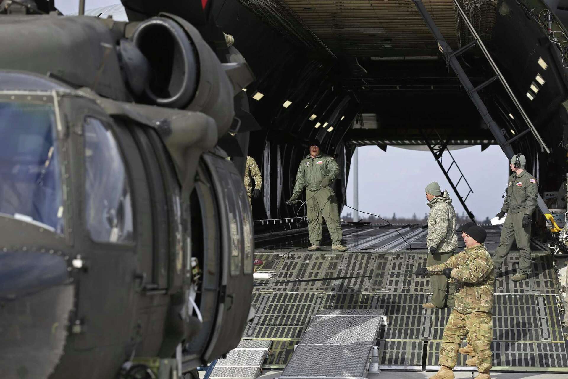In a giant plane, America sends a message