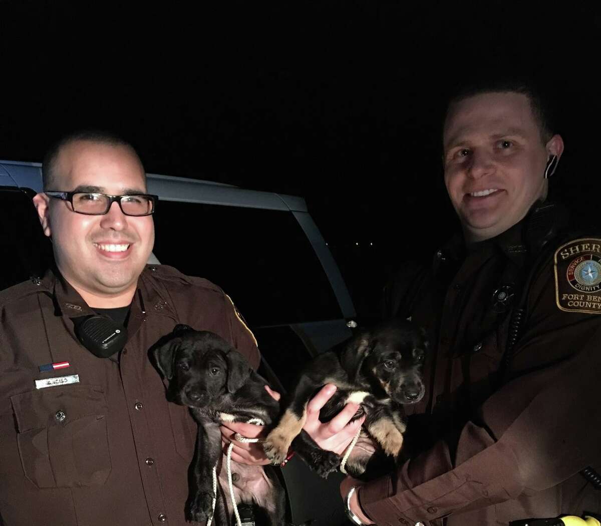 Fort Bend County deputies D. Lytton and M. Anciso are doing their part to make Monday better by adopting tiny puppies from the side of the road. 