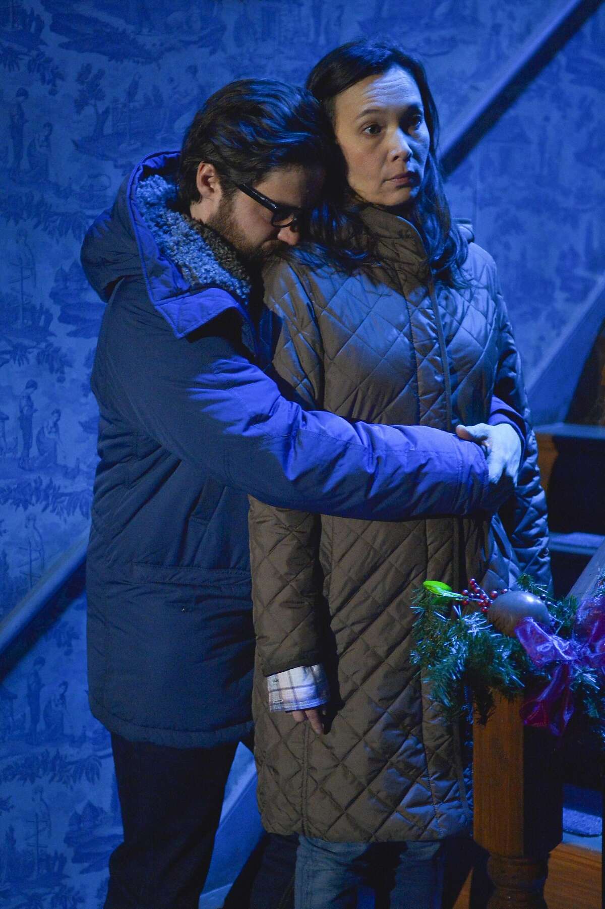 Elias (Joe Paulik) and Jenny (Stacey Yen) embrace in ACT's "John."