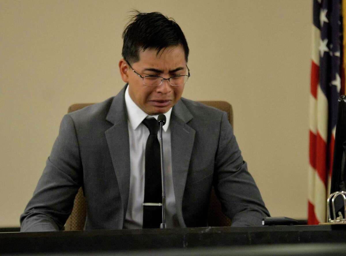 Emmanuel Galindo cries on the stand during the sentencing phase of his trial, Monday, March 6, 2017, in the 187th District Court in San Antonio. Galindo was convicted on charges of sexual assault, compelling prostitution, and official oppression.