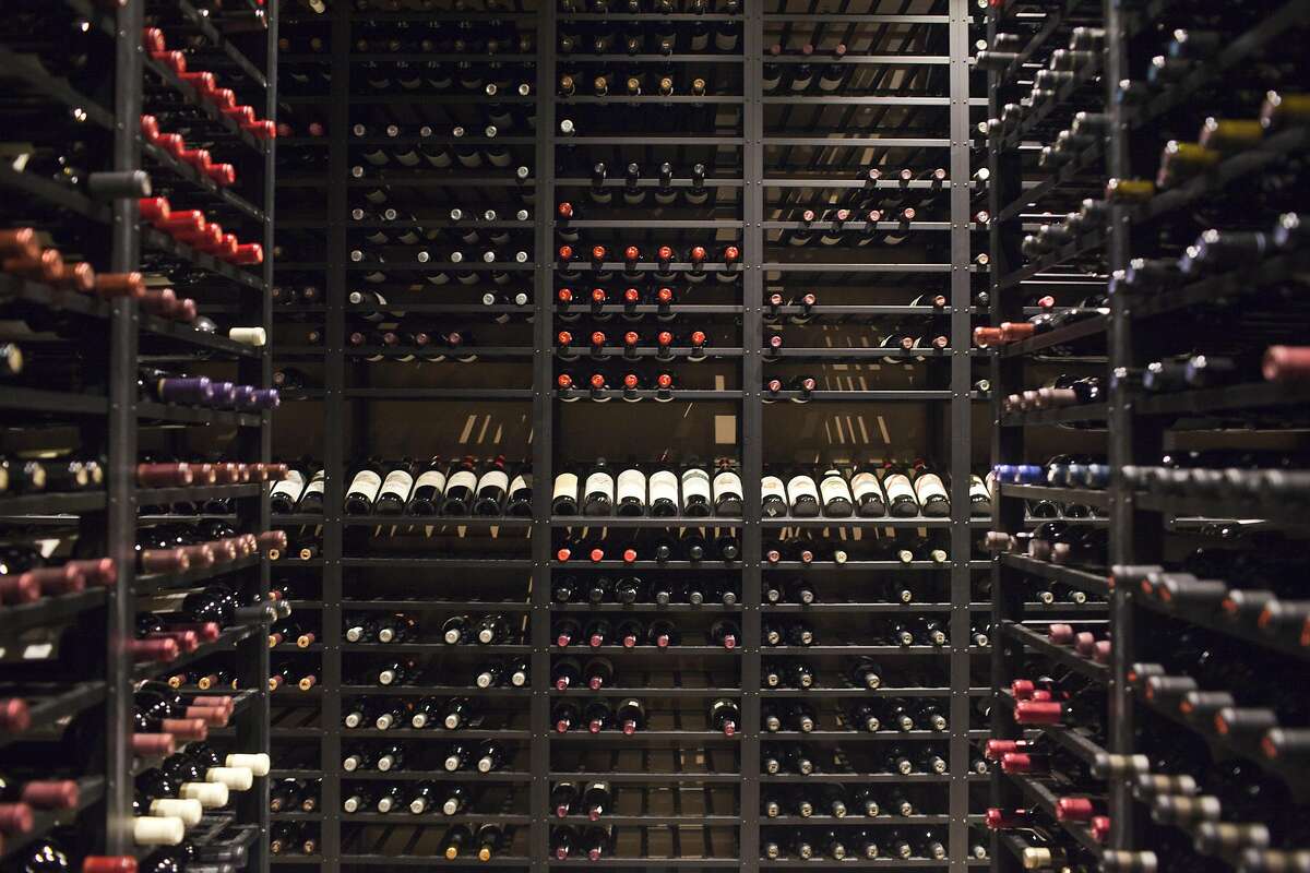 Vintage California bottles of wine fill the cellar at Press Restaurant in St Helena.