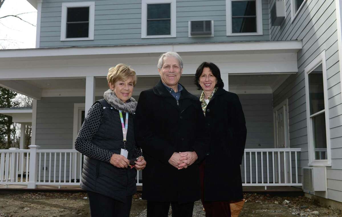 Fairfield County Hospice House board member Lynda Tucker, board co-chairman Rick Redniss, and Director of Development Colleen Harkey at the newly constructed FCHH facility in Stamford. FCHH is constructing a residential house designed for people on hospice to receive end of life care. The change in legislation paved the way for the construction of this six-bedroom, 10,000 square foot house located in a residential neighborhood in Stamford just off the Merritt Parkway providing easy access to the lower Fairfield County community.