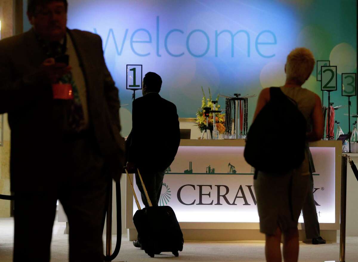 People are shown in the lobby during CERAWeek at the Hilton Americas,1600 Lamar St., Monday, March 6, 2017, in Houston.