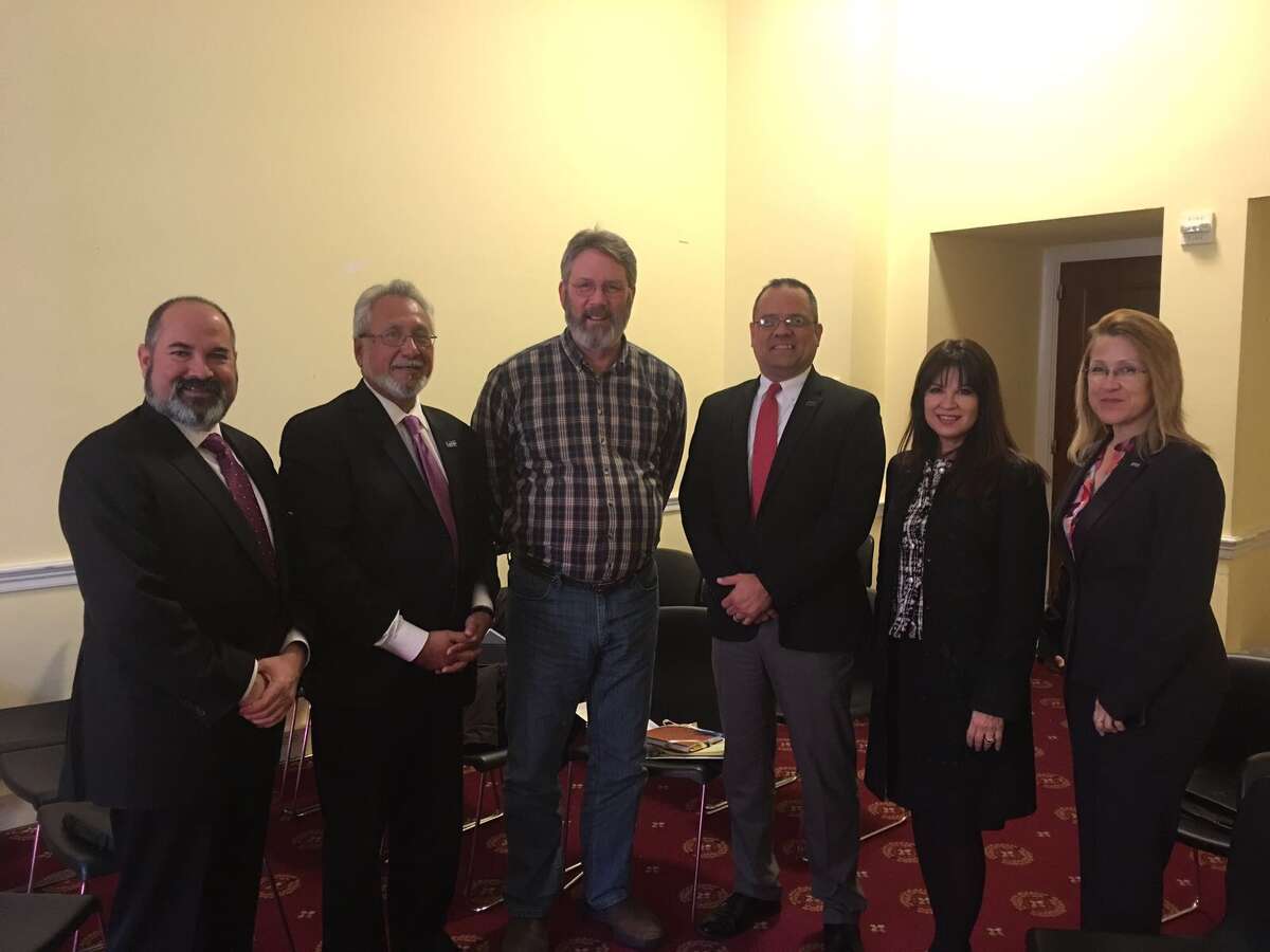 Laredo delegation members pose Monday with Scott Carter, Chief of Governmental Affairs for the Food and Nutrition Service within the U.S. Department of Agriculture. From left to right are: Roli Ortiz, Killam Development; Dr. Hector Gonzalez, Laredo Health Department Director; Carter; Robert Eads, Assistant City Manager; Olivia Varela, Laredo Development Foundation Director; and Claudi San Miguel, Acting General Manager for El Metro.