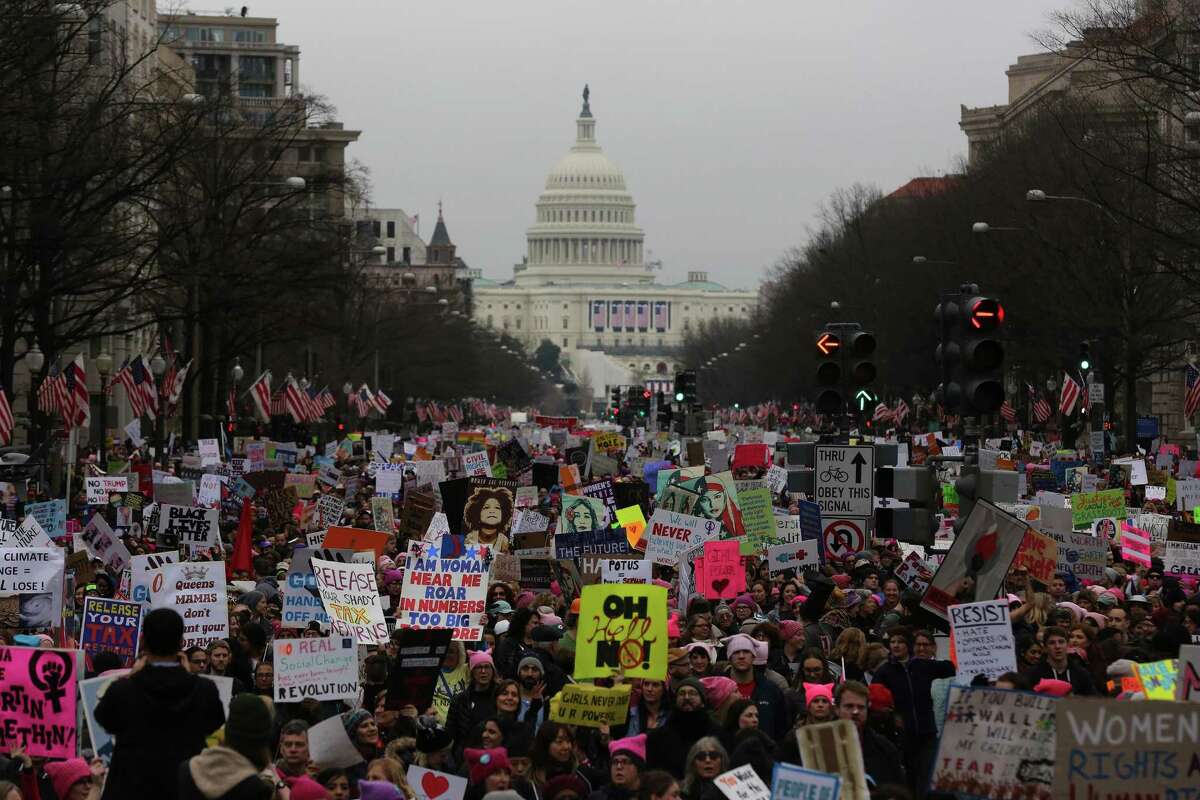 Tens of thousands march to the White House down Pennsylvania Avenue during the Women’s March on Washington on Jan. 21. The march’s organizers are calling for female workers to stay home on Wednesday for “A Day Without a Woman,” a national day of protest intended to call attention to the critical role women play in the labor force.