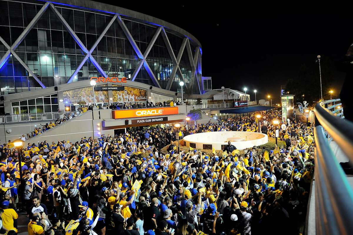 Fans who attended a Game 6 Warriors Watch Party dance outside Oracle Arena after the Golden State Warriors won the NBA championship at Oracle Arena in Oakland, CA Tuesday, June 16, 2015.