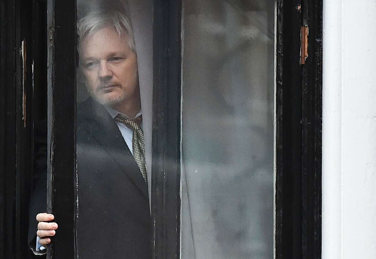 (FILES) This file photo taken on February 05, 2016 shows WikiLeaks founder Julian Assange coming out on the balcony of the Ecuadorian embassy to address the media in central London. A Swedish appeals court will decide on September 16, 2016 whether to maintain an arrest warrant for WikiLeaks founder Julian Assange over a 2010 rape accusation which he fears could lead to his extradition to the US. / AFP PHOTO / BEN STANSALLBEN STANSALL/AFP/Getty Images